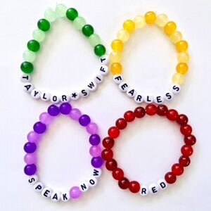 Bundle of 4 Taylor Swift Eras bracelets / debut, fearless, speak now, red